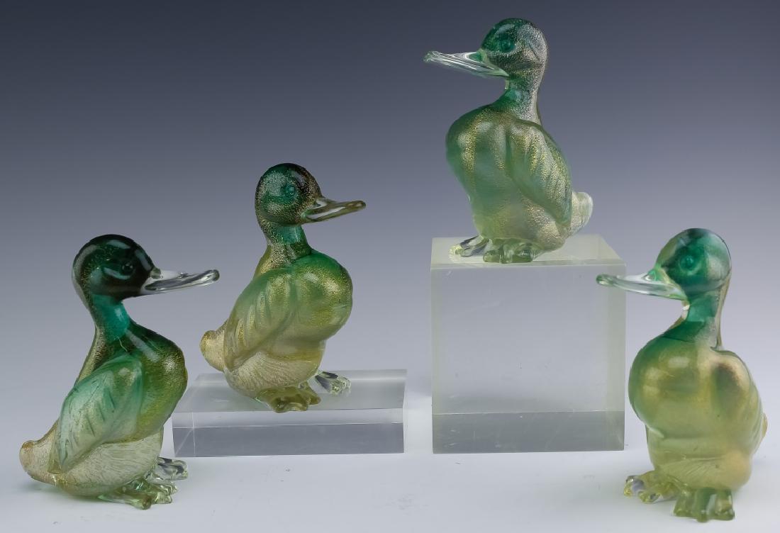 4 Murano Italian Art Glass Duckling DUCK Bird Sculpture: Hand crafted of mouth blown Italian art glass. Features a green fading to clear crystal body with gold fleck details. Retain the original Made in Murano labels. Tallest measures 5" x 4 1/2" Good condi