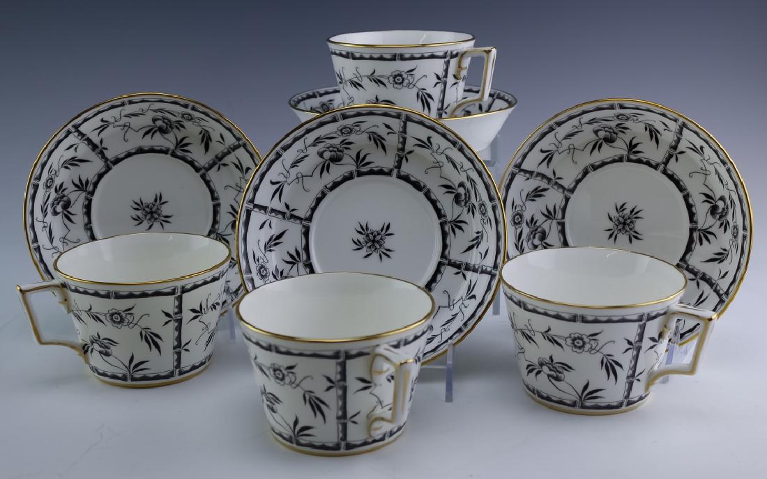 Tiffany & Co Hammersley Bamboo Black Cups, Saucers: Hammersley English bone china for Tiffany & Co. oversized cups and saucers. Features the pattern Bamboo Black and consists of black bamboo and flowers with a gilt rim. Comes with (4) 6 1/4" oversized