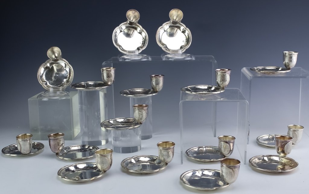 SET 16 Spanish 915 Silver Dishes & Cups 1,221gr.: Set of sixteen silver dishes. Crafted of Spanish 915 silver. Features a quatrefoil designed dish with attached cup. Hand hammered finish with coin decoration to cup. Possibly a Catholic communion dish