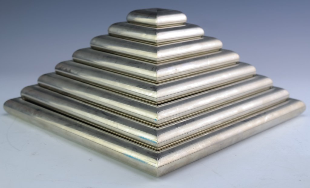Romeo Rega Modern Stacking Chrome Tray Pyramid: Mid Century Italian in the style of Romeo Rega, 1970's. Set of seven square graduated trays with chrome finish. Form a pyramid when stacked complete with small cap. Measures 12" x 12" x 5 3/4" Good co