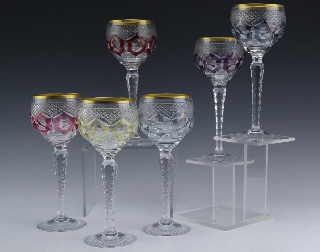 6 Bohemian Czech Cut Crystal Wine Goblets SET: Set of six Bohemian cut crystal wine goblets. Guaranteed Authentic. Features a series of cut crystal wine glasses with the bowls decorated with color cut to clear and a gold rim. Colors include cranbe
