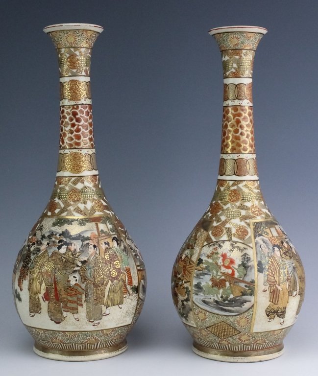 Pair Meiji Japanese Character Marked Satsuma Vases: Pair of old Meiji Japanese Satsuma vases. Features medallions on the bodies depicting court scenes with numerous figures as well as floral embellishments and intricate patterns and other motifs throug