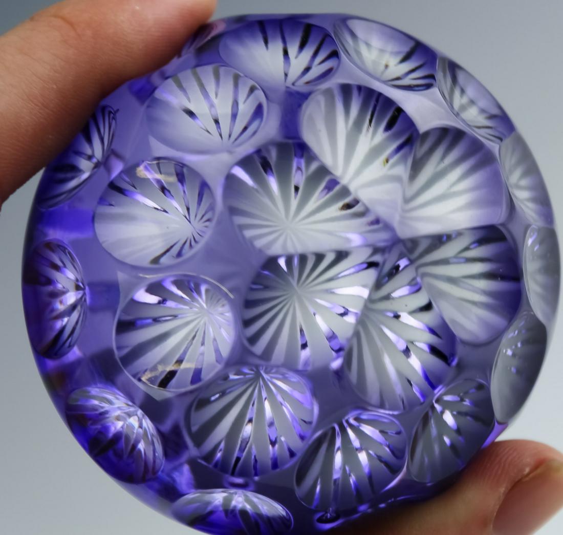Thomas Webb Corbett Amethyst Crystal Paperweight: Thomas Webb & Corbett studio art glass paperweight. Features purple cut to clear with the cus made in such a way as to provide varying levels of depth of color giving the paperweight a certain dynamic