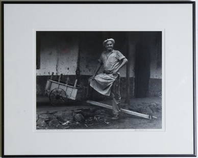 Mario Algaze b1947 American Cuban Photograph Photo: Mario Algaze (born 1947) Havana, Cuba. Titled: Don Celinio. Photograph depicts an older man with proud expression and his foot resting on a pull cart. Signed lower right. Algaze is a Cuban-American ph