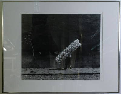 Mario Algaze b1947 American Cuban Photograph Photo: Mario Algaze (born 1947) Havana, Cuba. Photograph depicts a woman carrying a large quantity of cotton candy. Signed lower right and dated '84. Algaze is a Cuban-American photographer. He studied