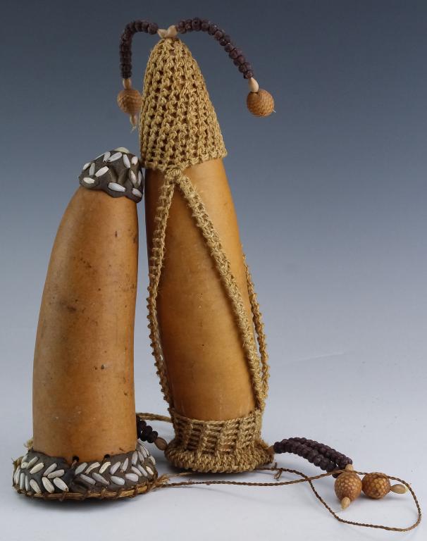 2 Ambunti Sepik Papua New Guinea Penis Gourds: Vintage pair of tribal penis gourds from the Sepik region of Papua New Guinea. Features a body crafted from a dried gourd with woven fabric embellishments and dangling and inlaid beads. Measures 7 1/2