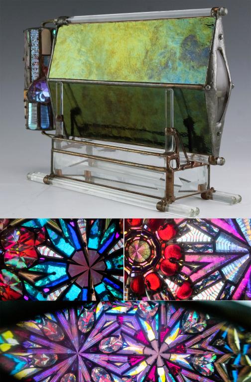 Rioux Studio Art Glass L/E Kaleidoscope & Stand: Studio art glass kaleidoscope by Elissa & Bob Rioux. Features a hand made art glass kaleidoscope with stained art glass panels as well as colorful cane and faceted crystals. Signed and numbered 169/25