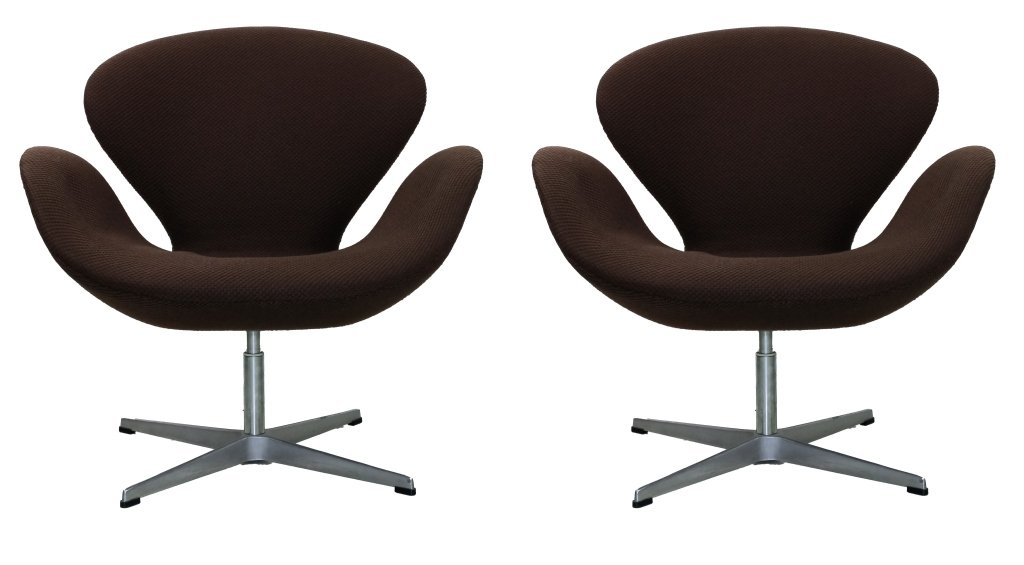 Pair Arne Jacobsen Fritz Hansen Swivel Arm Chairs: Pair of Arne Jacobsen, for Fritz Hansen, swiveling brown upholstered vintage armchairs. Features the classic Swan cahir design with swiveling base. Marked with Fritz Hansen 1979 label and Frits Hansen