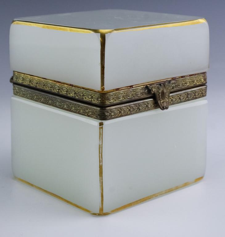 French White Opaline Glass Jewelry Casket Box: Antique jewelry trinket dresser box. Crafted of fine quality French white opaline glass. Gold gilt highlighted borders and brass hinge hardware. Square shape design. Measures approximately 4 1/4" x 4"