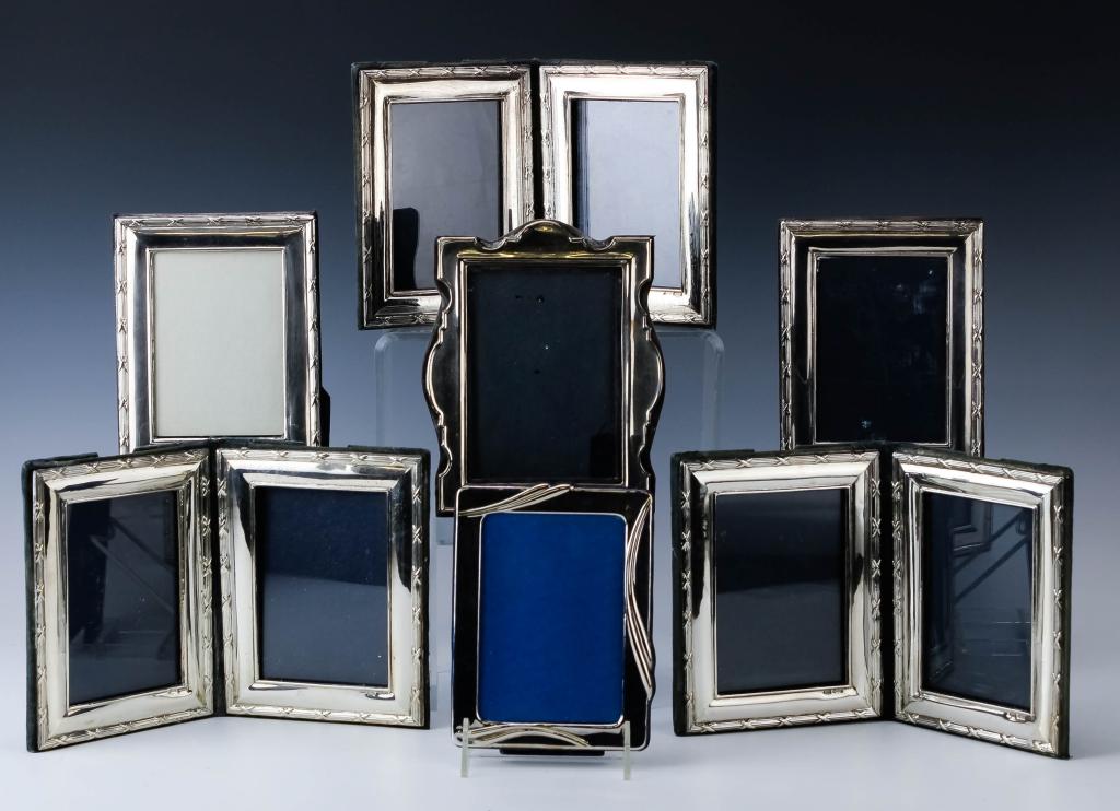 Lot of 7 Sterling Silver Photo Picture Frames 925: Collection of English sterling silver picture frames. Features silver over a velvet lined body with various designs with three folding frames included. Measures 6 3/4" x 5" with photo windows measurin