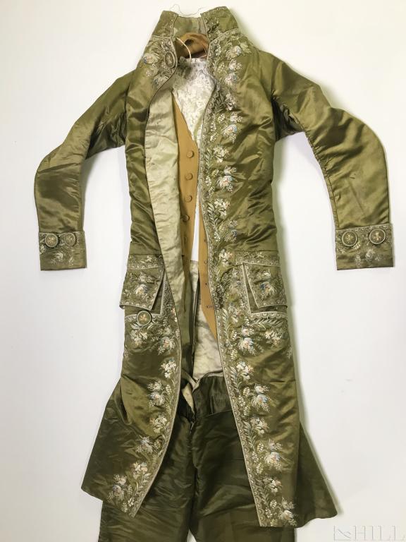 18th Century French Profusely Embroidered Male Costume: Early Male Costume (French, Austrian, 18th Century or later) Heavy Green Gentleman's Costume Embroidered Thread on Silk and Velvet Textiles: Coat, White Vest and Trousers Condition: Good condition. Fo