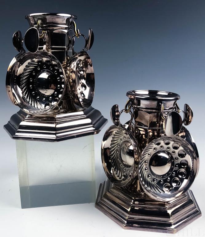 Pair Christofle Gallia Candlesticks w/ Wine Cups: Pair of Christofle candlesticks with hanging wine tasting cups, tastevins. Features the Gallia pattern with a pair of candlesticks with hooks for a set of 8 wine tasting cups. Marked with older Christ