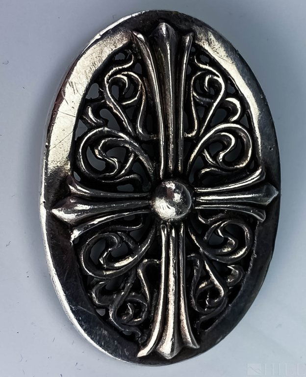 VTG Chrome Hearts 925 Sterling Silver Belt Buckle: Chrome Hearts sterling silver belt buckle. Features a reticulated cross design measuring 3 1/8" x 2 1/8". Marked on reverse. Weighs 108.7 grams. Good overall condition with minor wear. Hill Auction Ga