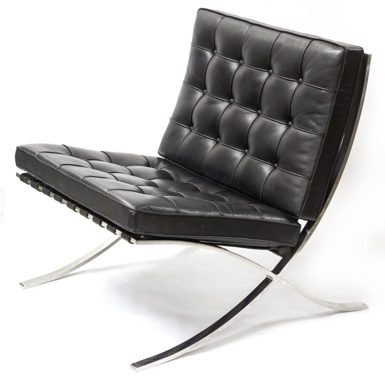 Knoll Mies Van Der Rohe Black Barcelona Chair: Authentic Knoll, Ludwig Mies van der Rohe Barcelona chair. Features black leather cushions and metal X form frame. Signed on leg. Measures 31" x 30 1/2" x 29 1/2". Good overall condition with minor we