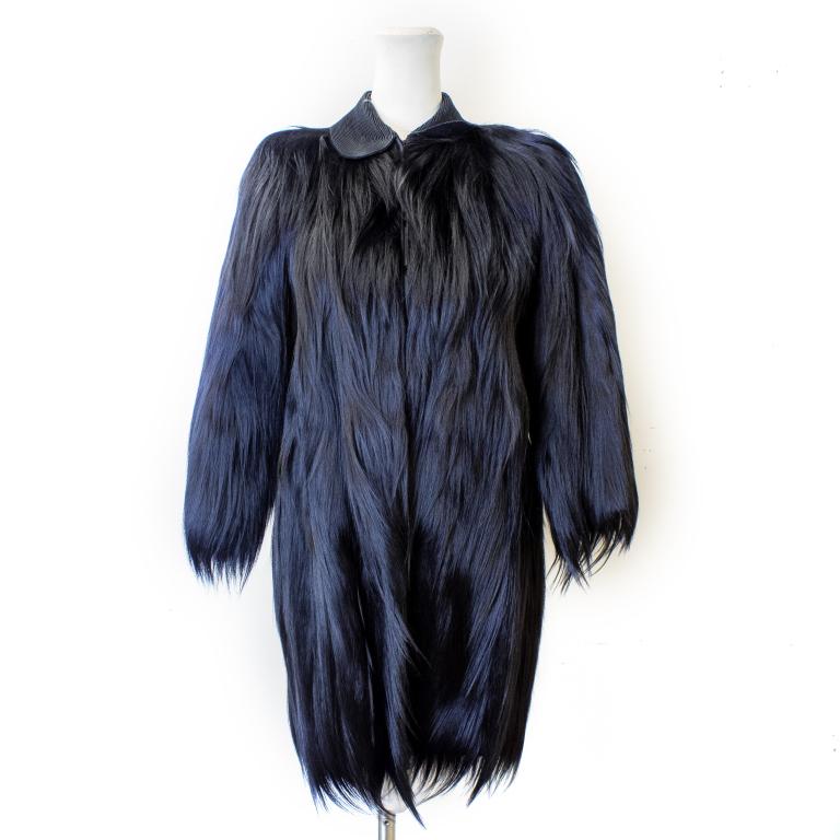 Art Deco Ladies Full Length Black Monkey Fur Coat: Vintage Bencha Gold Coast monkey fur coat. Full length jet black glossy monkey fur with peter pan collar and front hook closure. Coat has two front pockets. "Bencha Model Gold Coast" label at collar,