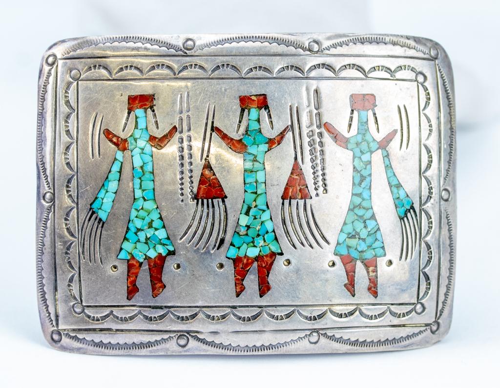 VTG J. Nezzie Navajo Sterling Silver Belt Buckle: Vintage Native American Navajo Indian sterling silver belt buckle. Features three crushed turquoise and coral figures surrounded by stamped decoration. Signed on verso. Measures 2 1/4" x 3". Weighs 52