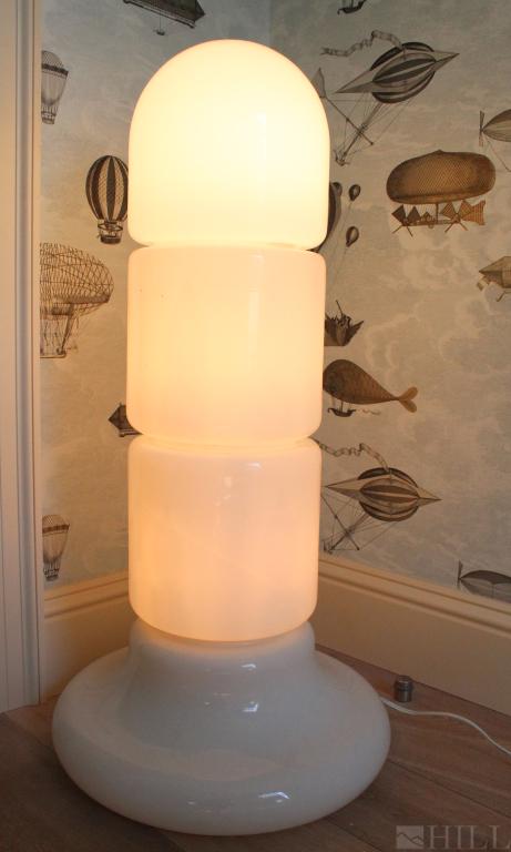 Claudio Salocchi ZEA White Art Glass Floor Lamp: Column form with three vertical sections on a wide base. Designed by Claudio Salocchi (1934-2012 Italy) for Lumenform circa 1968. Lamp 40 in. x 20 in. Good condition with mild surface wear. Hill Aucti