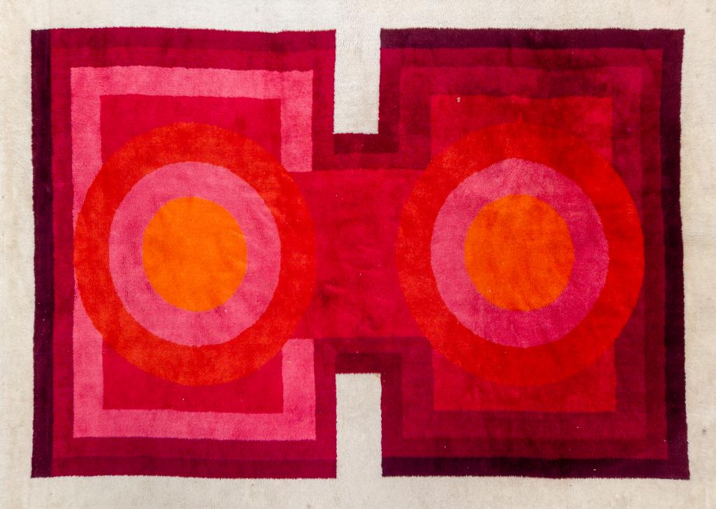 Verner Panton Romantica Floor Rug Carpet 129"x95": Large room size rug designed by Verner Panton (1926-1998 Danish) Square and round design in red and orange shades against a white background. Rug 129 in. x 95 in. Good condition with mild surface wear