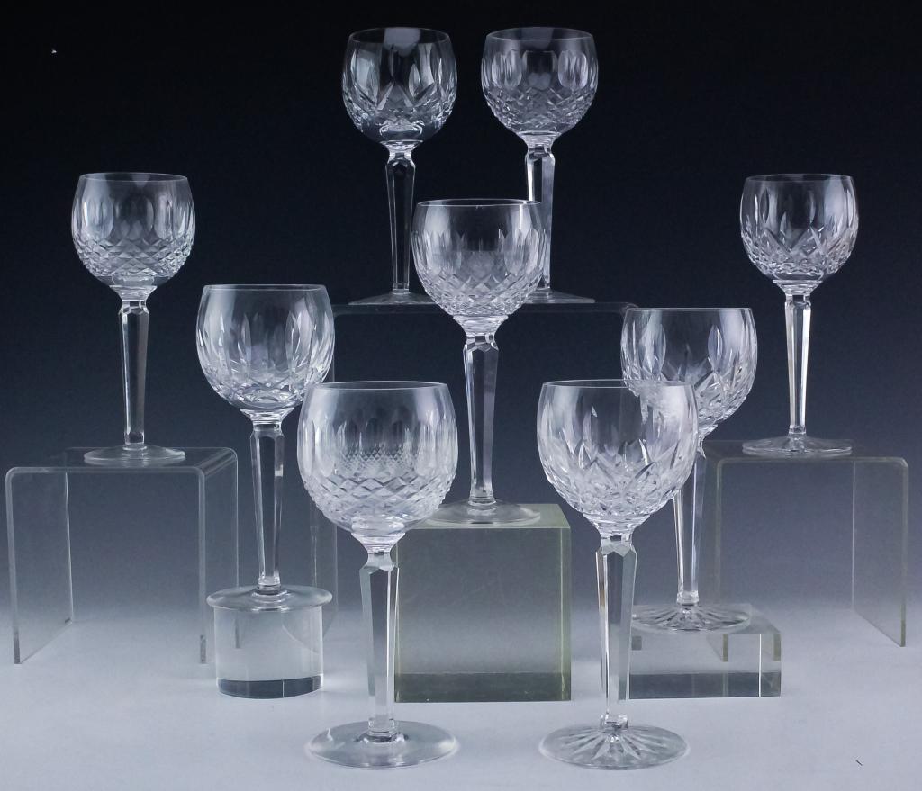 9 Waterford Crystal Colleen & Lismore Wine Hocks: Set of nine Irish crystal red wine hock glasses by Waterford in two different patterns. Features four in the the hand cut Colleen, and five in the hand cut Lismore pattern. Measures 7 1/4" x 3". Signe