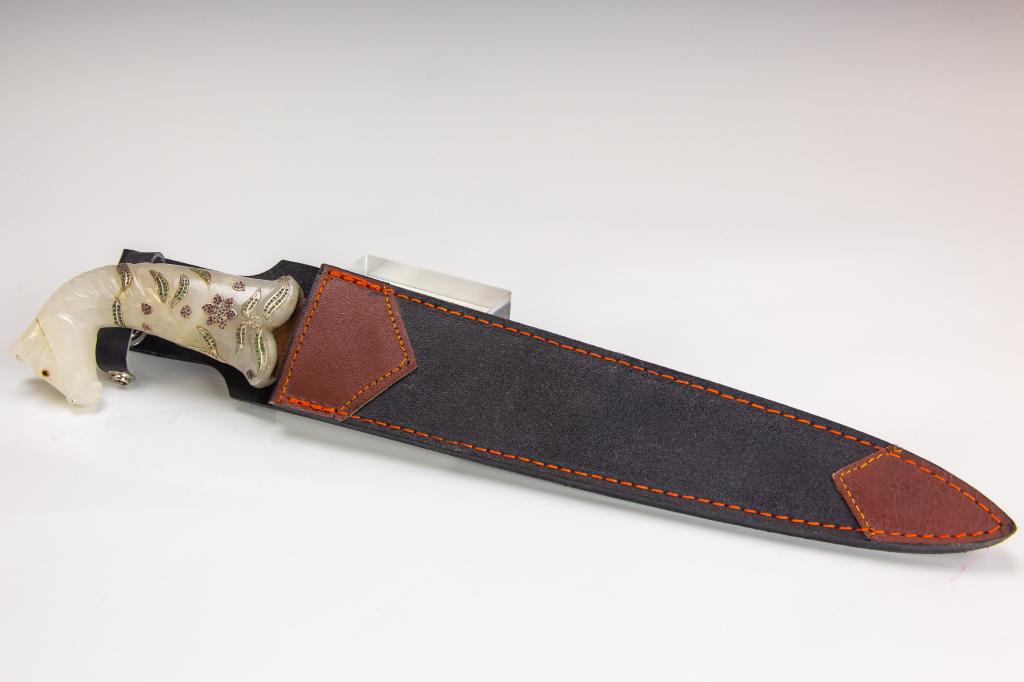 VTG Mogul White Jade Emerald Ruby Gemstone Dagger: Jeweled Mogul Asian jade handled knife. Features a white jade handle with jeweled silver inlay with diamonds emerald and rubies. Blade measures 10" with 5 1/4" handle. Good overall condition with loss