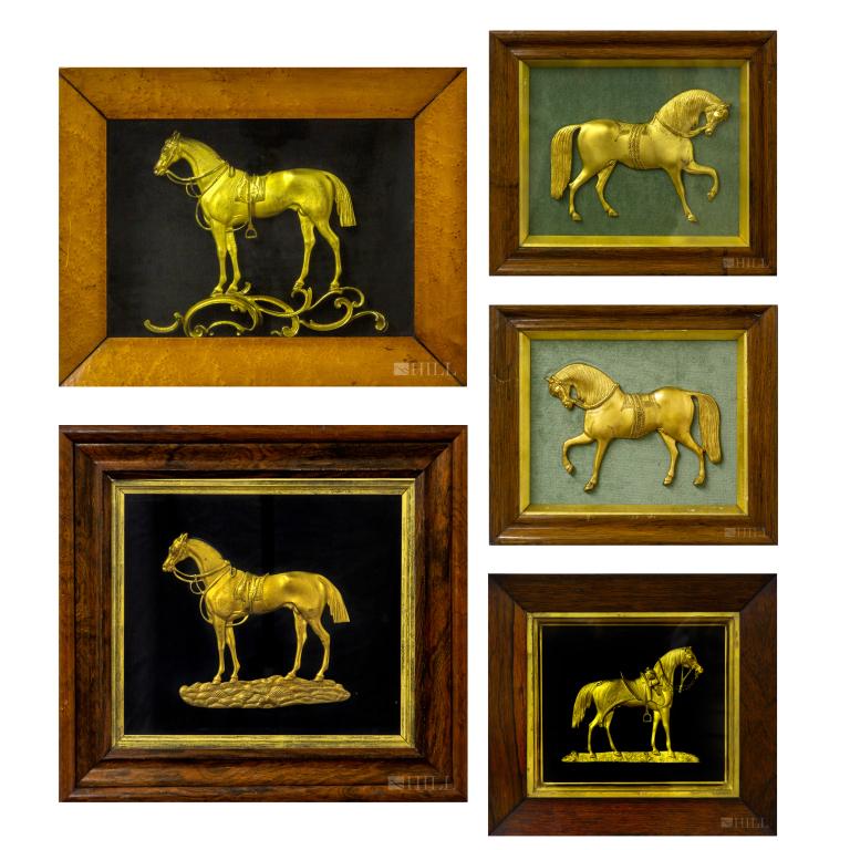 Lot 5 19c English Dore Bronze Horse Relief Plaques: Assembled grouping of five antique English 19th century horse relief plaques. Crafted of bronze with rich gold finish. Each depict a prize winning horse in relief profile. Housed in shadow box style f