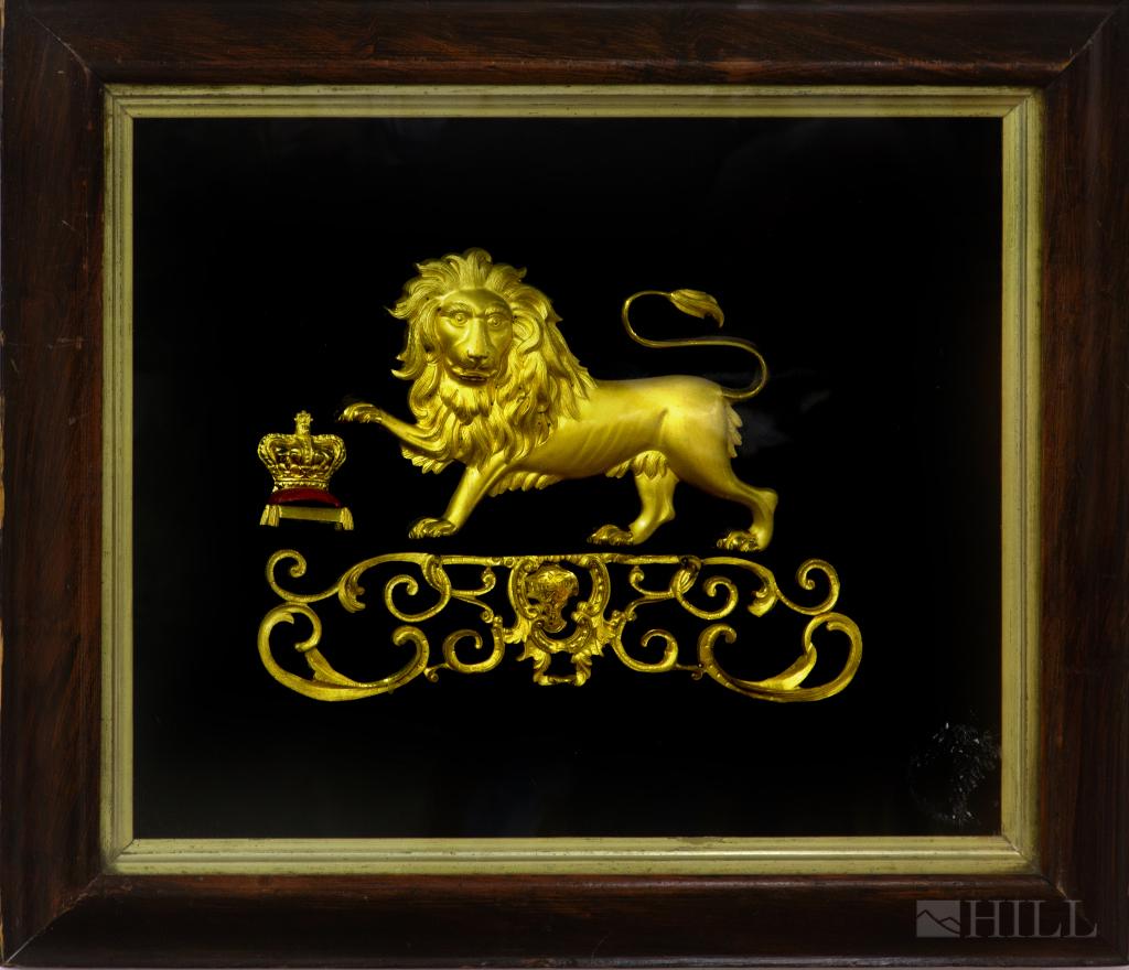 19c English Dore Bronze Lion Crown Relief Plaque: Antique English 19th century Britannia plaque. Crafted of bronze with rich dore gold finish. Depicts a lion with a crown on a stool. Engraved plaque underneath reads "Britannia" Frame measures 19 1/2�