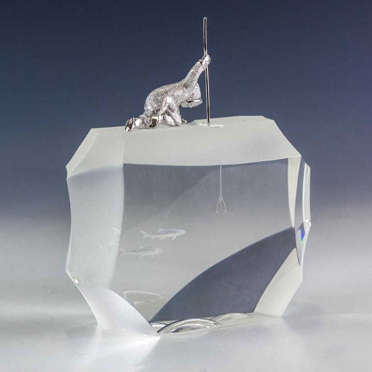 Steuben Art Glass Arctic Fisherman Ice Sculpture: Designed by James Houston and released in 1974. "Houston Arctic Series: Arctic Fisherman, #1023" Crafted of fine quality Steuben American art glass crystal and sterling silver. Signed Steuben. Sculptu