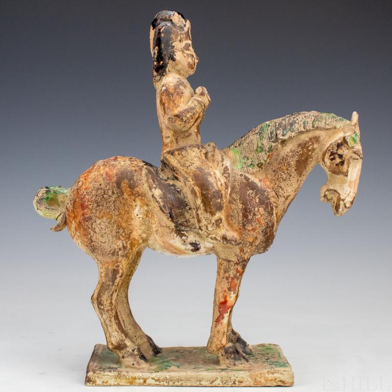 Vintage Chinese Ceramic Horse & Rider Roof Tile: Old Chinese ceramic roof tile. Features a rider, possibly a warrior, on horseback. Figure decorated with speckled polychrome glaze. Measures 12 1/4" x 10 3/4" x 3 1/2". Good condition with age related