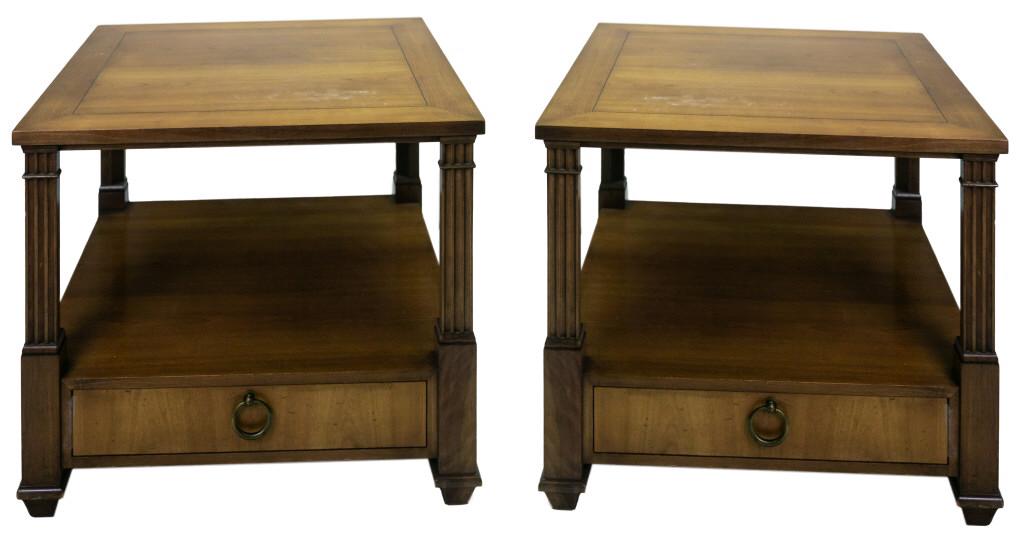 Pair Quality Baker Fruitwood Side Tables & Drawers: Pair of wood side table by Baker Furniture. Each are square with upper tier supported by columnar support with the lower tier featuring a drawer. Measures 22" x 26" x 26". Marked Baker. Good overall c