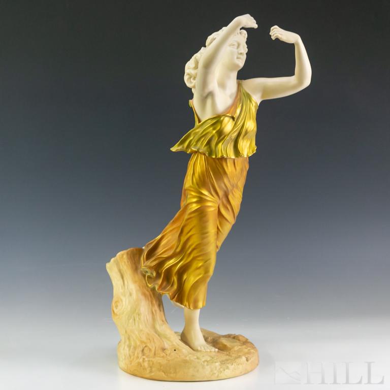 Large Royal Worcester James Hadley Figural Statue: Antique large figural statue by James Hadley for Royal Worcester. Crafted of fine quality English porcelain. Features a female design wearing a rich gold gilt dress. Signed with the Royal Worcester ma