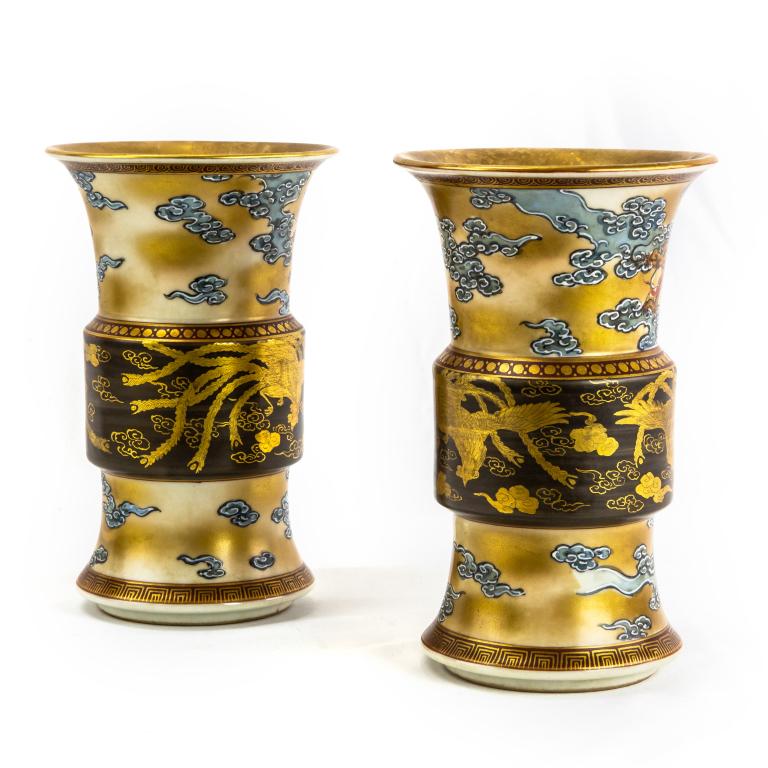 Pair Meiji Satsuma Japanese Dragon Pottery Vases: Fine antique pair of Meiji period Satsuma pottery vases. Features finely painted decorated scenes with dragons and clouds,black and gold gilt phoenix birds in the center. Signed with Japanese mark on