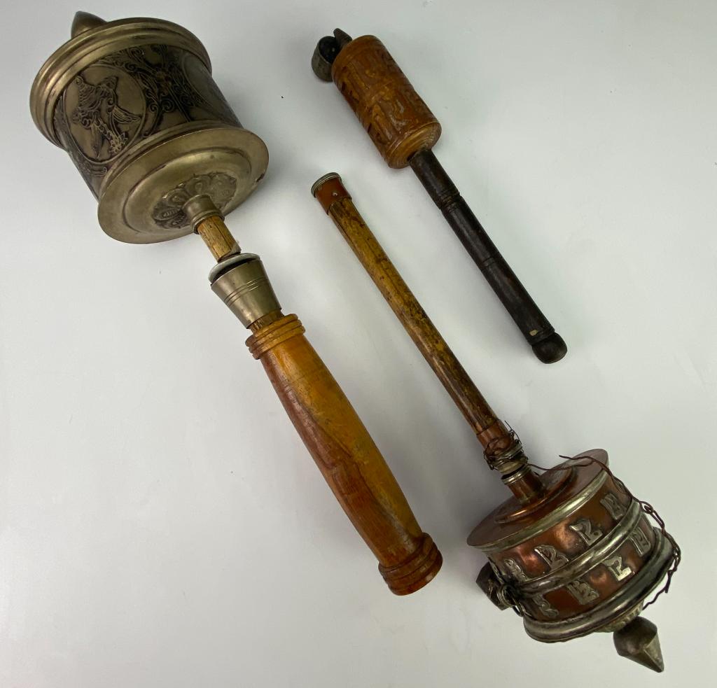 LOT 3 Tibetan E. Asian Copper Prayer Wheel Scrolls: Estate lot of three Tibetan Asian export prayer wheels. Includes wood carved prayer wheel, copper and chased metal prayer wheel with bamboo handle and paper scroll inside, and chased metal prayer whee