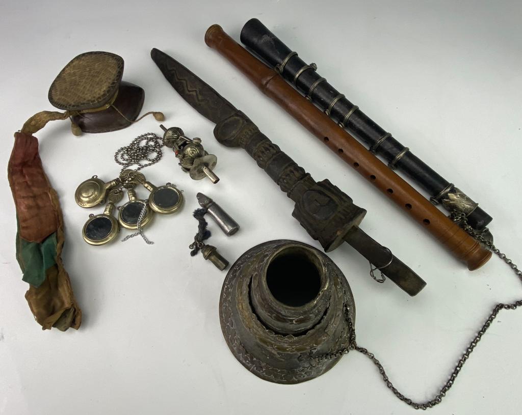 Lot 12 Asian Tibetan Ceremonial Charm Flutes Drum: Estate lot of 12 assorted Asian Tibetan Indian ceremonial charm pieces and flutes. Includes 4 mirror charms marked India, Sharat, and cased metal seal press on string. Includes two wood flutes, and wo