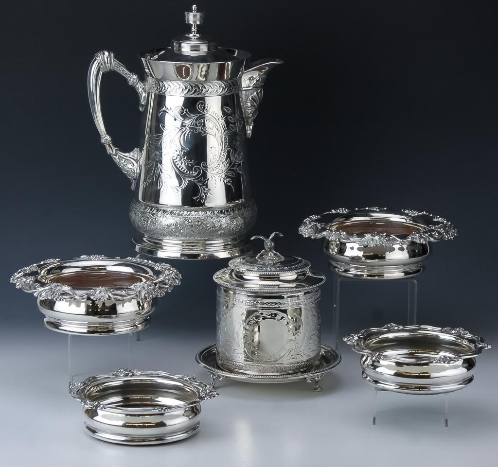 Lot Old Silver Plated Wine Coasters Pitcher Casket: Collection of fine antique silver plated hollowware. Features two pairs of repousse wine coasters with wood base measuring 2" x 6 1/2" and 3" x 8 1/4". Also comes with a large neo classically etched p