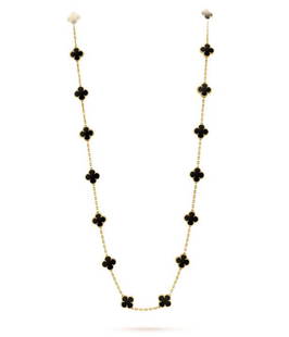 VCA Van Cleef & Arpels 20 Motif Alhambra Necklace: Guaranteed Authentic Vintage Van Cleef & Arpels black onyx Alhambra necklace. Features 20 clover motif Alhambra necklace in solid 18k yellow gold and black onyx. Measures 33 1/2 in. long and