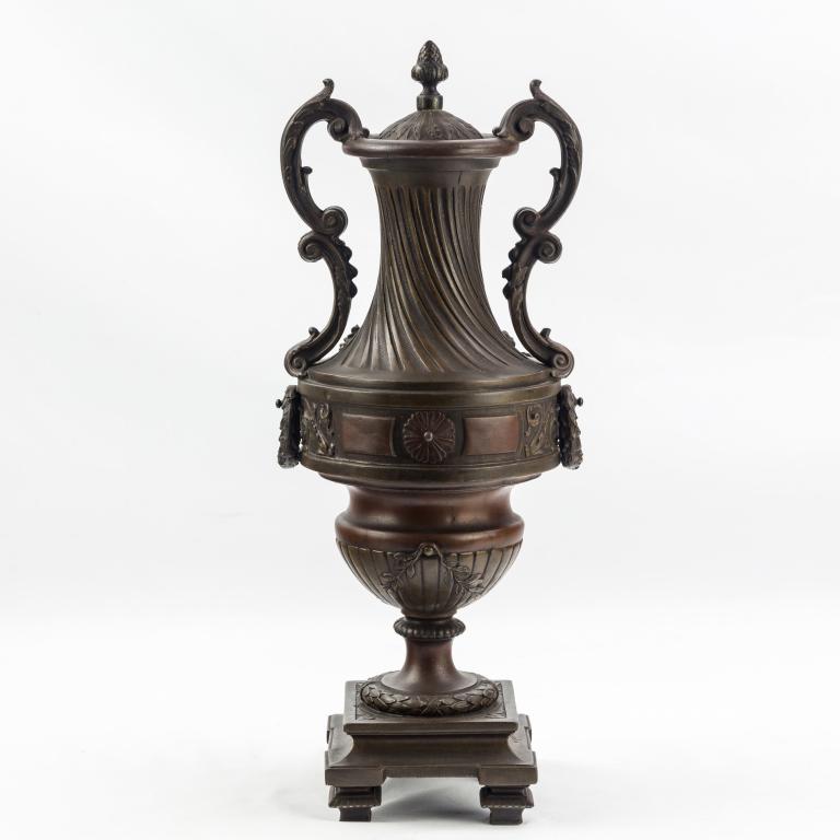 L&F Moreau French Bronze Cherub Amphora 18" Urn: after L & F Moreau (French, 20th Century) French double handle amphora shaped urn. Fine detailed garland and wreath trim and cherub and bird front relief. Signature at base. Approximate 18 in. x 8 in.
