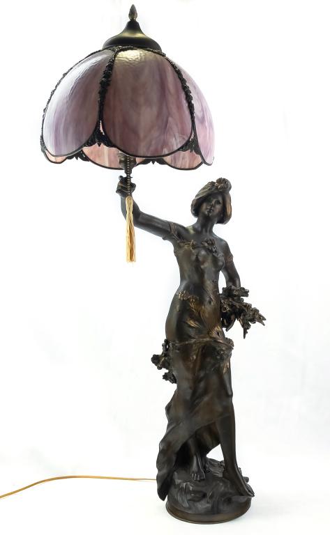 A Moreau Art Nouveau Figural Lamp Slag Glass Shade: after Auguste Moreau (French,1834-1917) Art Nouveau bronze figural lamp with original purple slag glass lampshade. Shade composed of six violet slag glass panels with ornate bronze trim. Artist signat