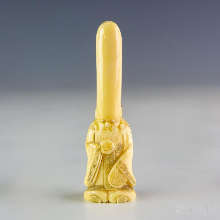 Japanese Fukurokuju Bone Lucky Wise Man Figurine: Antique Chinese carved bone figurine. Features the form of Fukurokuju, one of the seven lucky gods. Unsigned. Measures 5" x 1 1/2" x 1". Good overall condition with minor wear, restoration. Hill Aucti