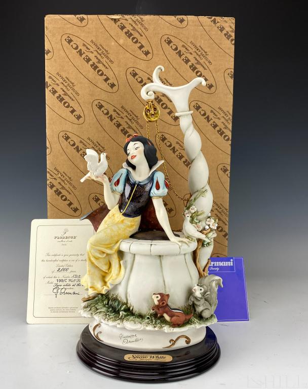 Giuseppe Armani Walt Disney Snow White At Well MIB: Giuseppe Armani Walt Disney's Snow White at the well #119C. Ltd Ed # 1202/2000 with COA. Artist Signed Giuseppe Armani. Depicts Snow White, gazing at a white bird in her hand, as she leans on a well, 