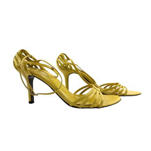 Sergio Rossi Yellow Leather Strap Sandals Size 36: Authentic Sergio Rossi yellow leather strap sandals. Size: EU 36 (Approximate) insole: 9 in. Heel height: 3 in. Sandals feature a wrap around ankle strap closure. Marked "Sergio Rossi ,Vero Cuoio, Mad