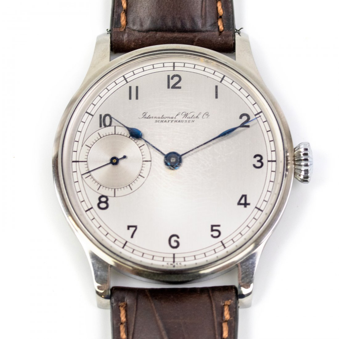 International Watch Co. IWC Vintage Style Watch: Vintage style IWC men's wrist watch. Features a working manual wind IWC pocket watch movement housed in a newer stainless steel case. The dial is brushed silver with Poires a Trous Carres hands. Case 