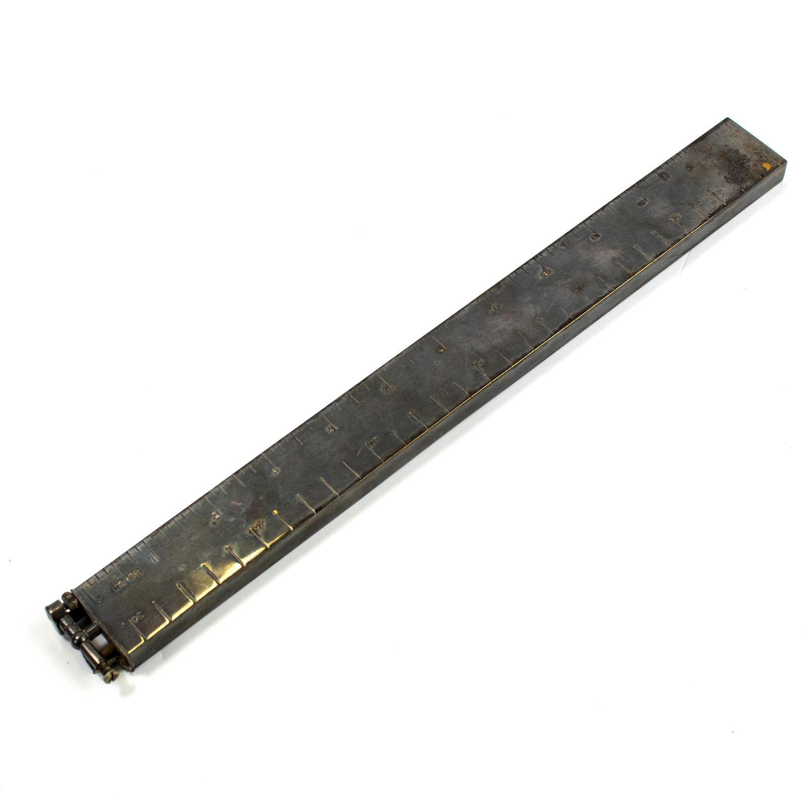 Rare Dunhill Silver Plated 12" Ruler Desk Lighter: Rare silver plated ruler lighter by Dunhill. Features the accurate form of a ruler with lighter function. Signed Dunhill. Measures 12 3/4 in. x 1 1/4 in. Good / fair overall condition with missing end