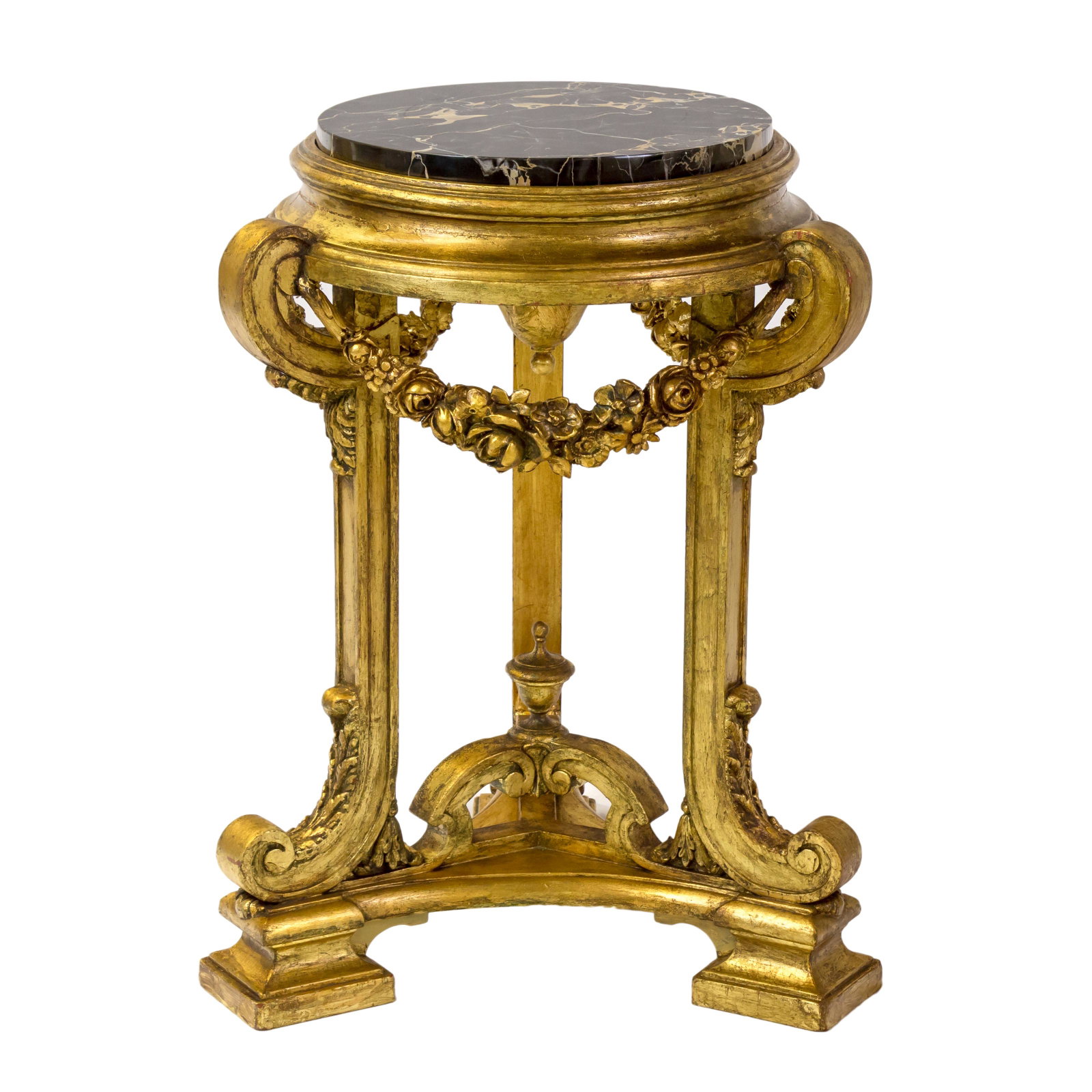 Art Nouveau Black Marble Gilded Foyer Side Table: An Art Nouveau style foyer table, side or end piece with a thick round black and gray marble top, set within a gilt decorated stand decorated with profuse carved flora and Neoclassical designs. Age re