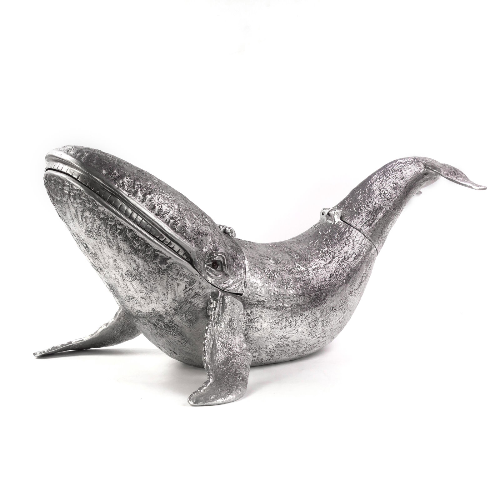 Arthur Court Aluminum Decor Whale Champagne Magnum: Arthur Court (American, 1928–2015). An aluminum champagne magnum ice bucket cooler and table decor. Sculpted as a large whale, with hinged head and tail for ice and spirits access. Decorated with se
