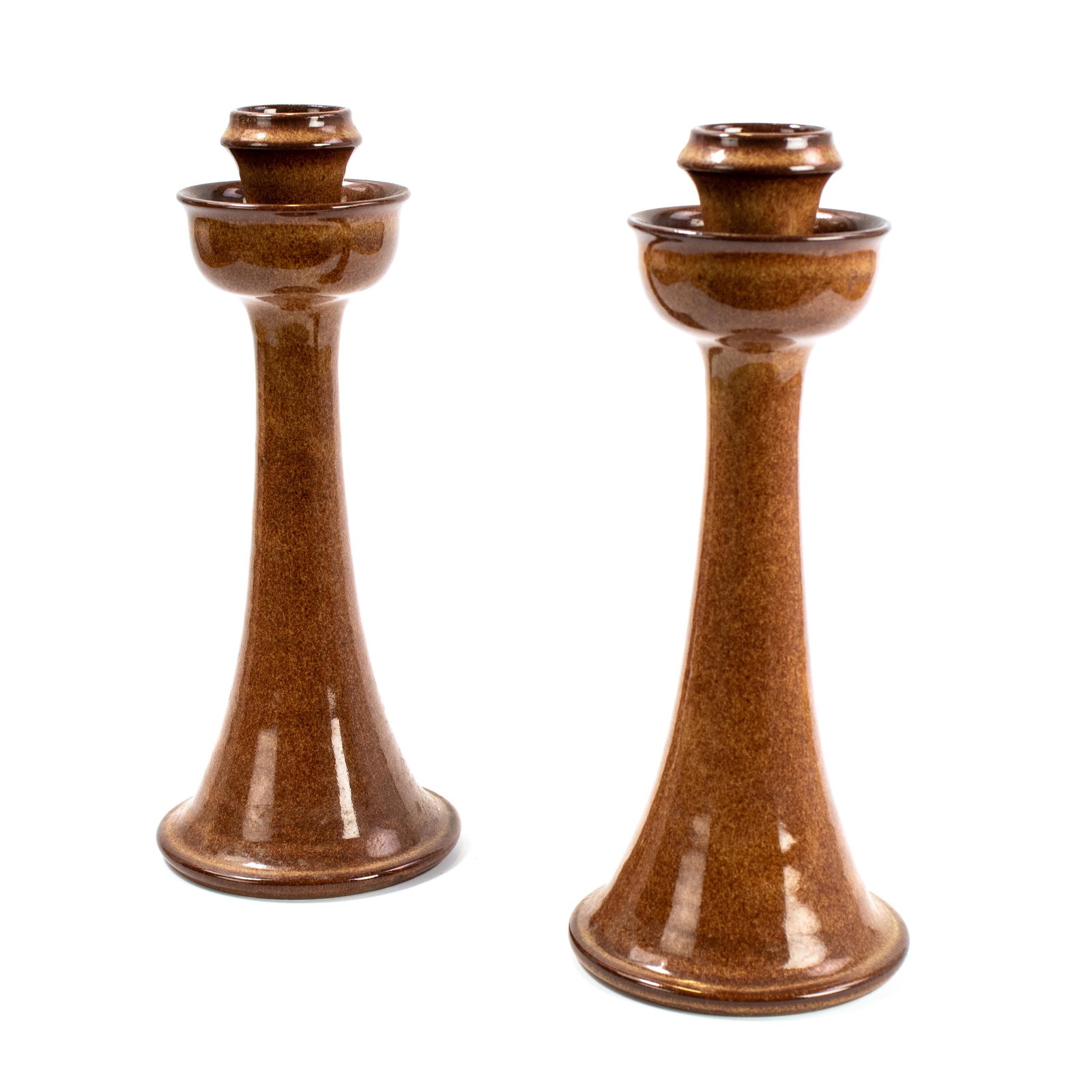 Vernon Owens Jugtown Art Pottery 12" Candlesticks: Vernon Owens (American, b. 1941). A pair of studio art pottery candlesticks by North Carolina based Jugtown Pottery. Featuring a sleek Modernist design with speckled brown glaze. Hand signed and impre