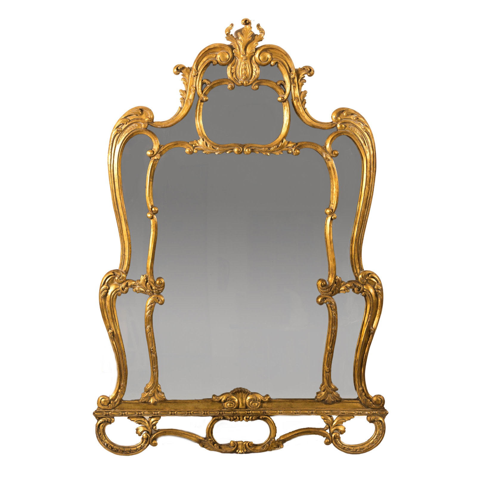 Ornate 62" Italian Gilt Wood Rococo Style Mirror: An elaborate gold gilt carved wood Italian Rococo style mirror, with ornately detailed frame featuring lovely leaves and flowing carved form. Measures 62 in. x 37 in. Good condition, showing mild age 