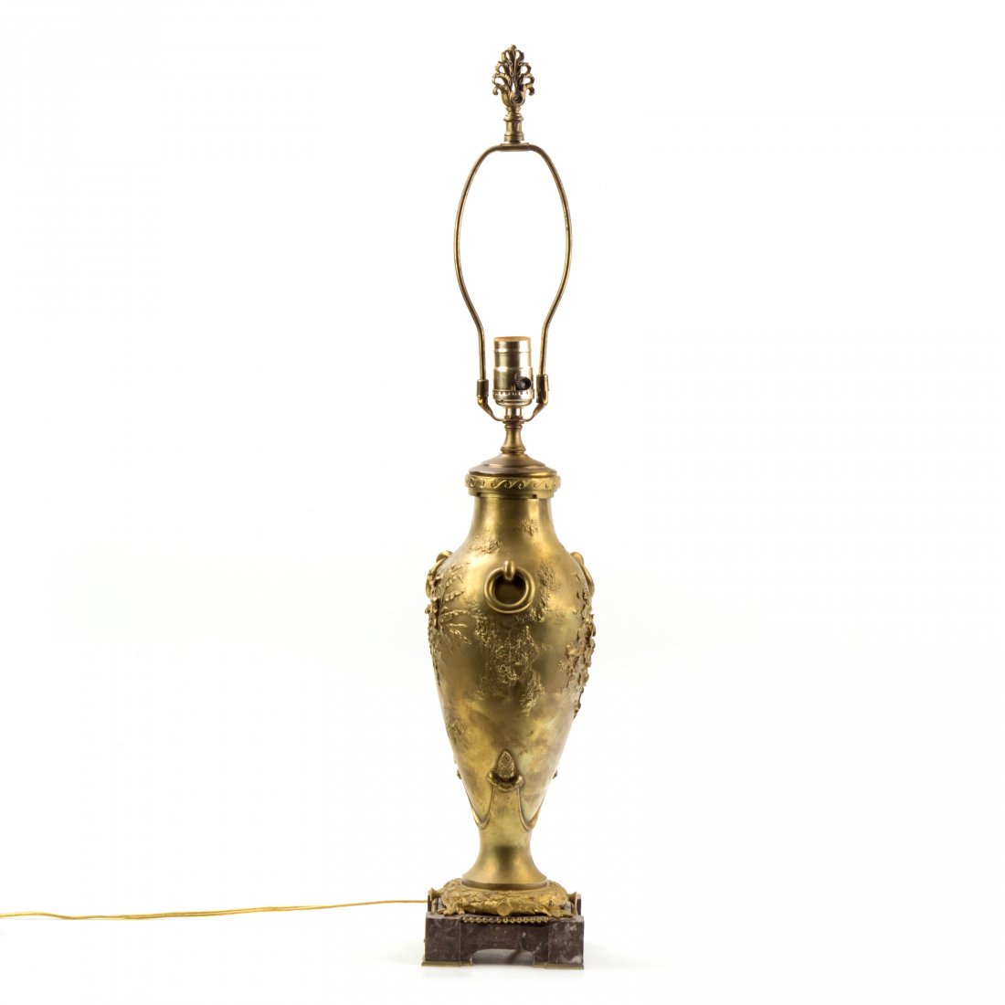 French Empire Gilded Bronze Art Nouveau Vase Lamp: An impressive circa late 19th century century gilt bronze table lamp, produced in the French Empire style with an exquisite central amphora style bronze sculpture, decorated with profuse gilded Art No
