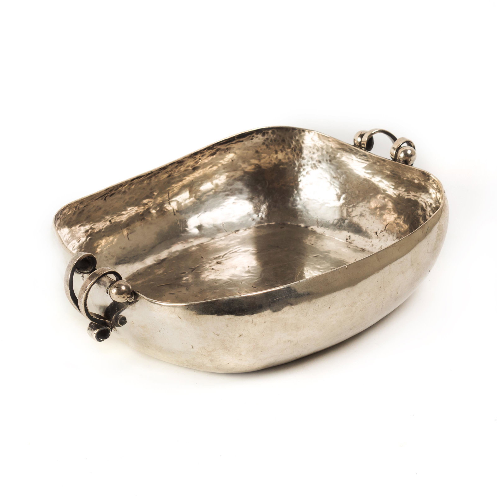 William Spratling Art Deco Sterling Silver SIGNED: William Spratling (American, 1900-1967). An early Sterling Silver bowl by Sprating, featuring scrolled and balled double handles with square form and rounded corners. Measures 2 3/4 in. x 10 in. x 7 1