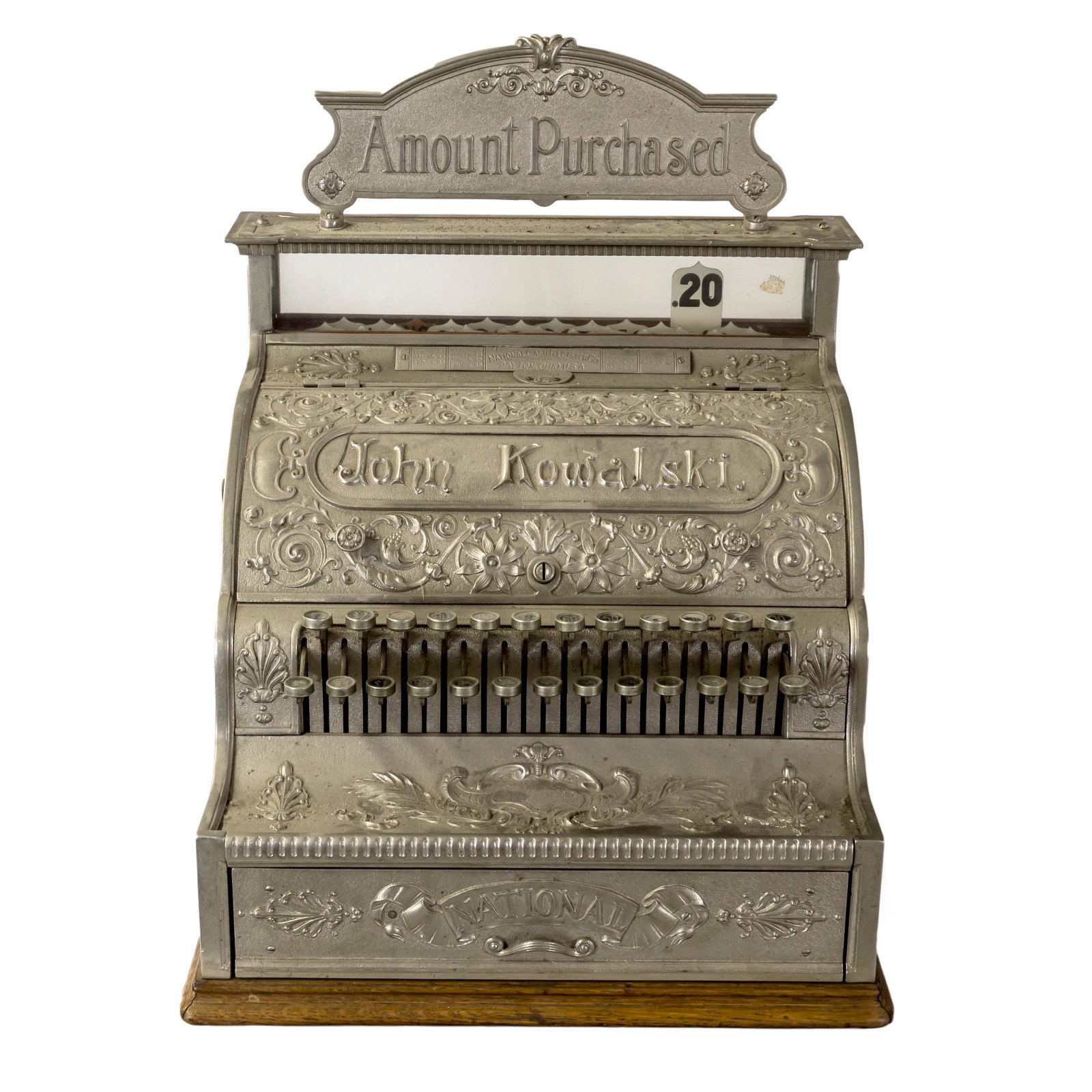 19th Century Old Country Store NCR Cash Register: An impressive, large nickel toned cash register machine, manufactured c. 1895 by National Cash Register of Dayton, Ohio. Ornately decorated with relief flora and other Art Nouveau designs, it displays