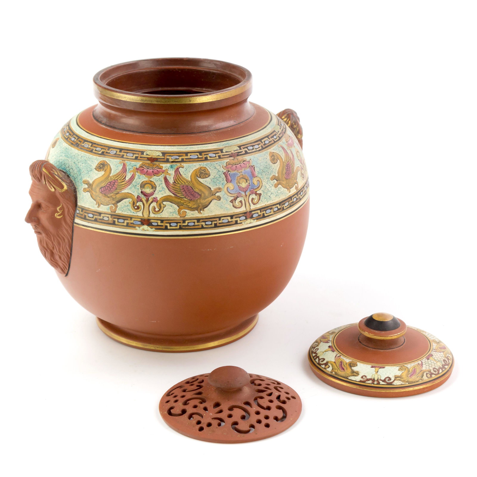 Antique Greek Griffin Pattern Terracotta Potpourri: Antique Terracotta Twin Handled Lidded potpourri with Greek griffin Pattern design. Features twin face handles, lid and inserted pierced tray. Unsigned. Measures 8 in. x 8 in. Good condition with mild